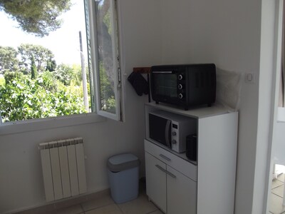 Apartment T2 Air conditioning summer / winter surrounded by a garden, private parking