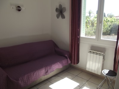 Apartment T2 Air conditioning summer / winter surrounded by a garden, private parking