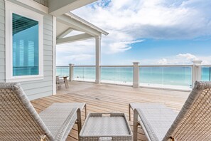 Top Floor Balcony with Lounger Chairs