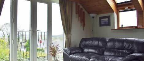 Loweswater sitting room is very spacious and light. Comfortable room with views