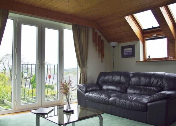 Loweswater sitting room is very spacious and light. Comfortable room with views