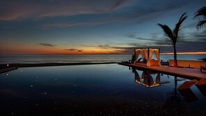 Infinity pool with beautiful night lighting.