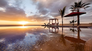 Three Cabana beds and plenty of chaise lounges.