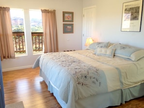 King bedroom with views of Moab Valley and the La Sal Mountains