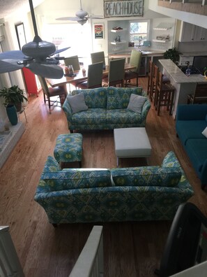 view of living and eating area from stairs