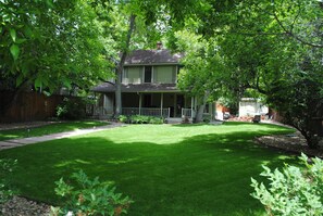 Mature  landscaped front yard. Set back well off the street for quiet comfort