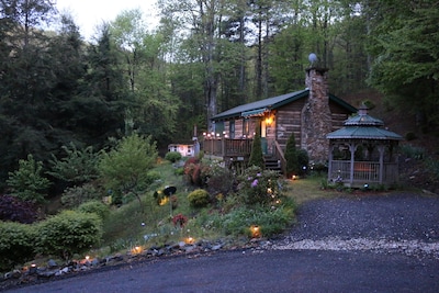 The Mountain Retreat...A view at dusk...with landscape lighting and room for 2+ cars