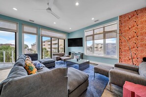 The Whole Family Has Room To Gather Without Being Crowded in This Luxury Living Room With Plush Seating For 8