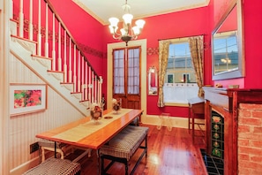 Looking back at front door and the dining space which can seat 8.