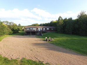 Sleeps 18, steps from River, fire pit, amazing sunsets & plenty of parking. 