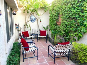 Listen to your bubbling fountain and RESORT music from your private front
Patio