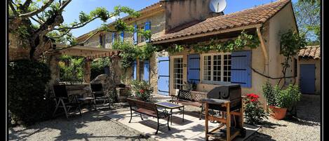 Front Entry showing BBQ terrace & outdoor dining