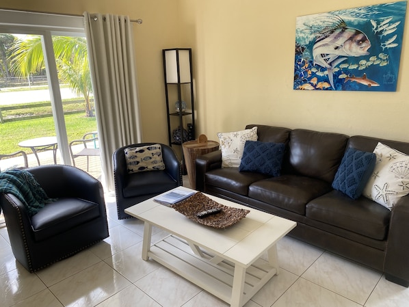 A spacious living room provides you ample room for relaxation and entertainment.