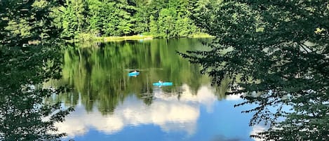 Looking out from the deck at the kayaks on the lake