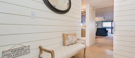 Entryway with shiplap and nautical décor greet you. 