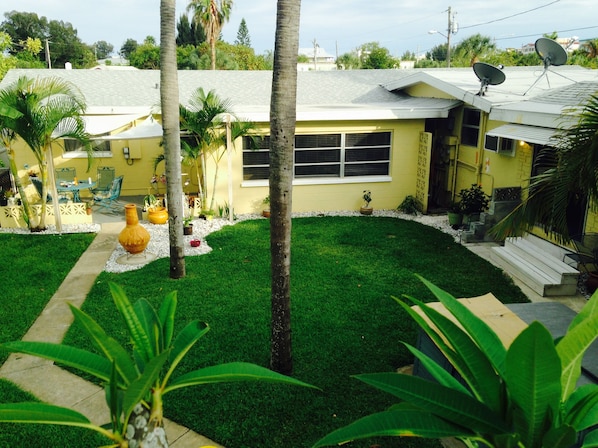 Aerial view of the back yard.  2 bedroom & patio L -1 bedroom on R