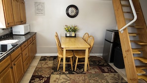 There is plenty of room in the kitchen area to meet your needs.