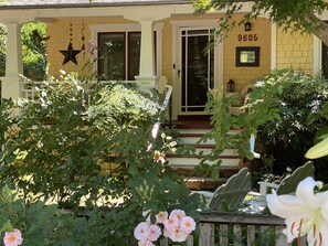 Spacious front porch with country charm.