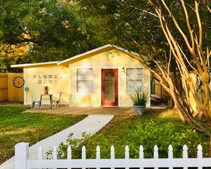 Flower Haus sits behind a picket fence on your own private lot.