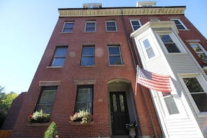 Located in a historic 1860 Boston Brick row house. Fort Hill Inn, Boston.