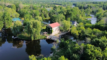 Showing the mill located on an island in the Salmon River.