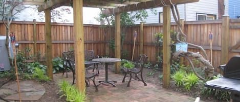 Shaded Brick Courtyard w/ Grill