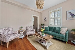 Newly renovated living room with ample seating and 55" smart TV for streaming!