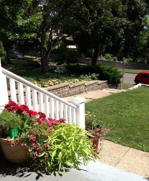 Front porch looking out towards street, plenty of street parking
