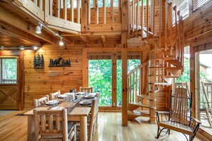 Spiral staircase leads to the upstairs loft.