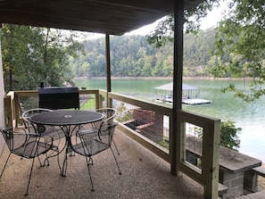 Grill, picnic table, & outdoor fireplace (NOT our boat dock in background)   