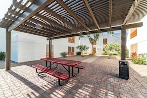 Multiple patios and BBQ stations