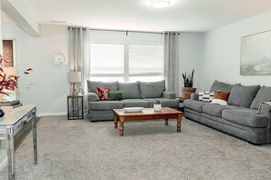 Bright, spacious living area with comfortable seating for everyone.