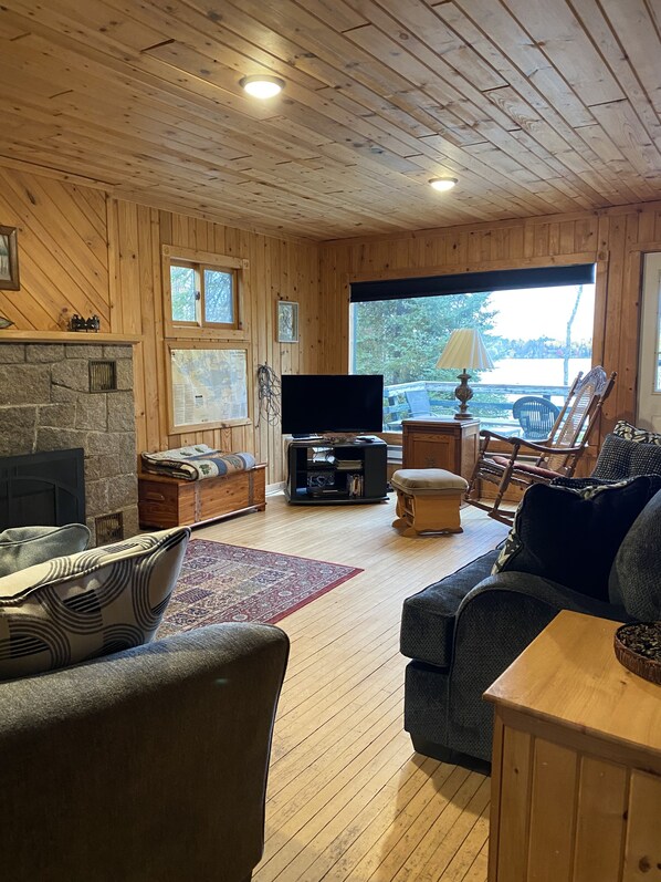 Living Room with new lighting, Dish TV, Wifi. Electric Fireplace insert. 
