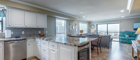 Brand new kitchen w/granite countertops and gorgeous view of gulf.  Bon appetit!