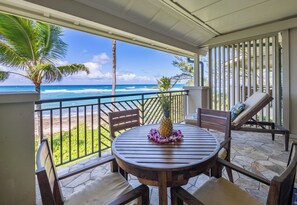 Watch the whales breach from your lanai! There is a dining table with 4 chairs, a chaise lounge, and a side table