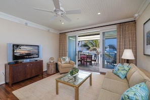 Dining and living room with ocean view! - 60" SMART TV, ceiling fan and sofa sleeper!