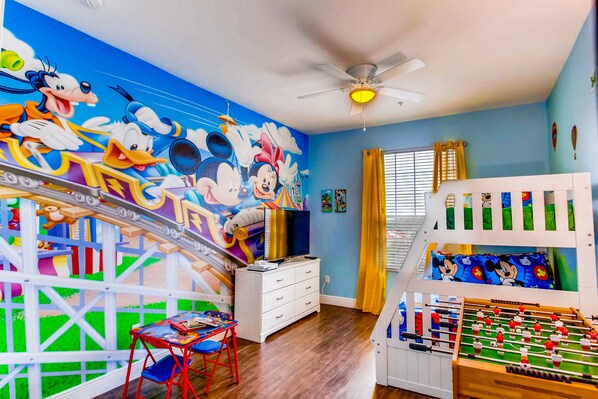 Bunk bed, foosball table, 50" 4K TV, X Box One S  & a view of Disney fireworks!