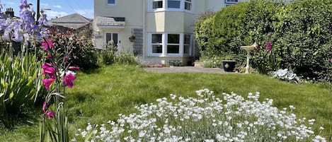 Cottage has a small, sunny garden.
Parking at front.