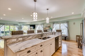 Gather at the Large island with seating-plus kitchen has everything you need!