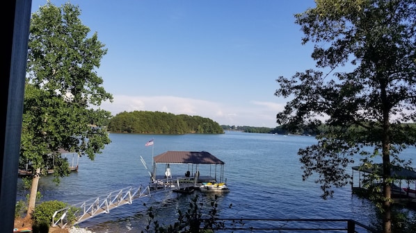 Oversized covered boat dock provides gorgeous views and plenty of shade