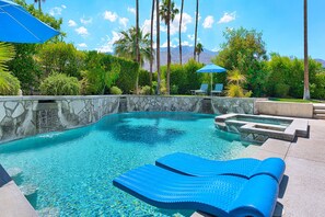 Lagoon shaped saltwater pool with spa and waterfalls