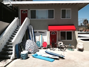 It is the upstairs unit with balcony and beach gear
