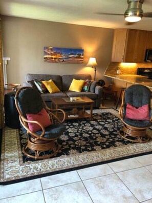 Living Room w/ Queen Sofa, & Ratan Swivel Rockers