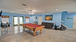 1st floor huge game room w/ billiard will surely entertain your large