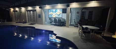 100 inch screen and projector with external speakers.