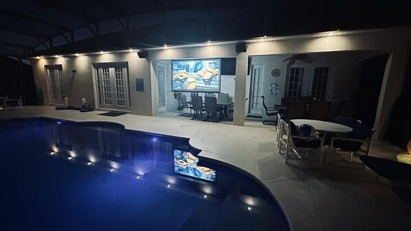 100 inch screen and projector with external speakers.