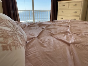 Enjoy beach views from the master bed.