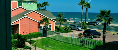 Condo's view of the ocean and beach from the balcony