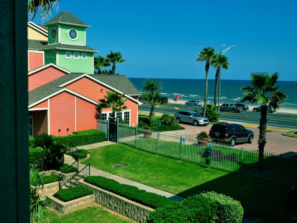 Condo's view of the ocean and beach from the balcony