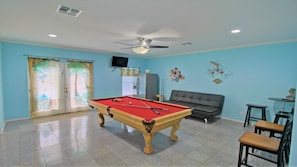 Billiard table, refrigerator, futon, bar table , more than 200 channel cable TV